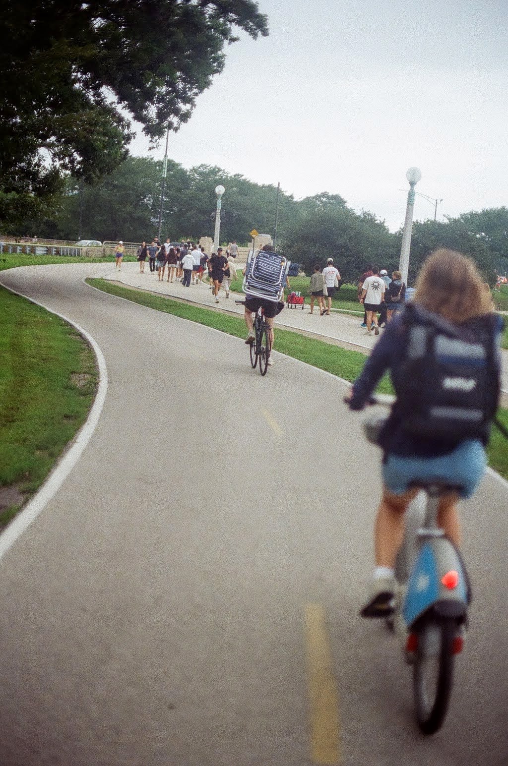 Cyclists riding along a Chicago path