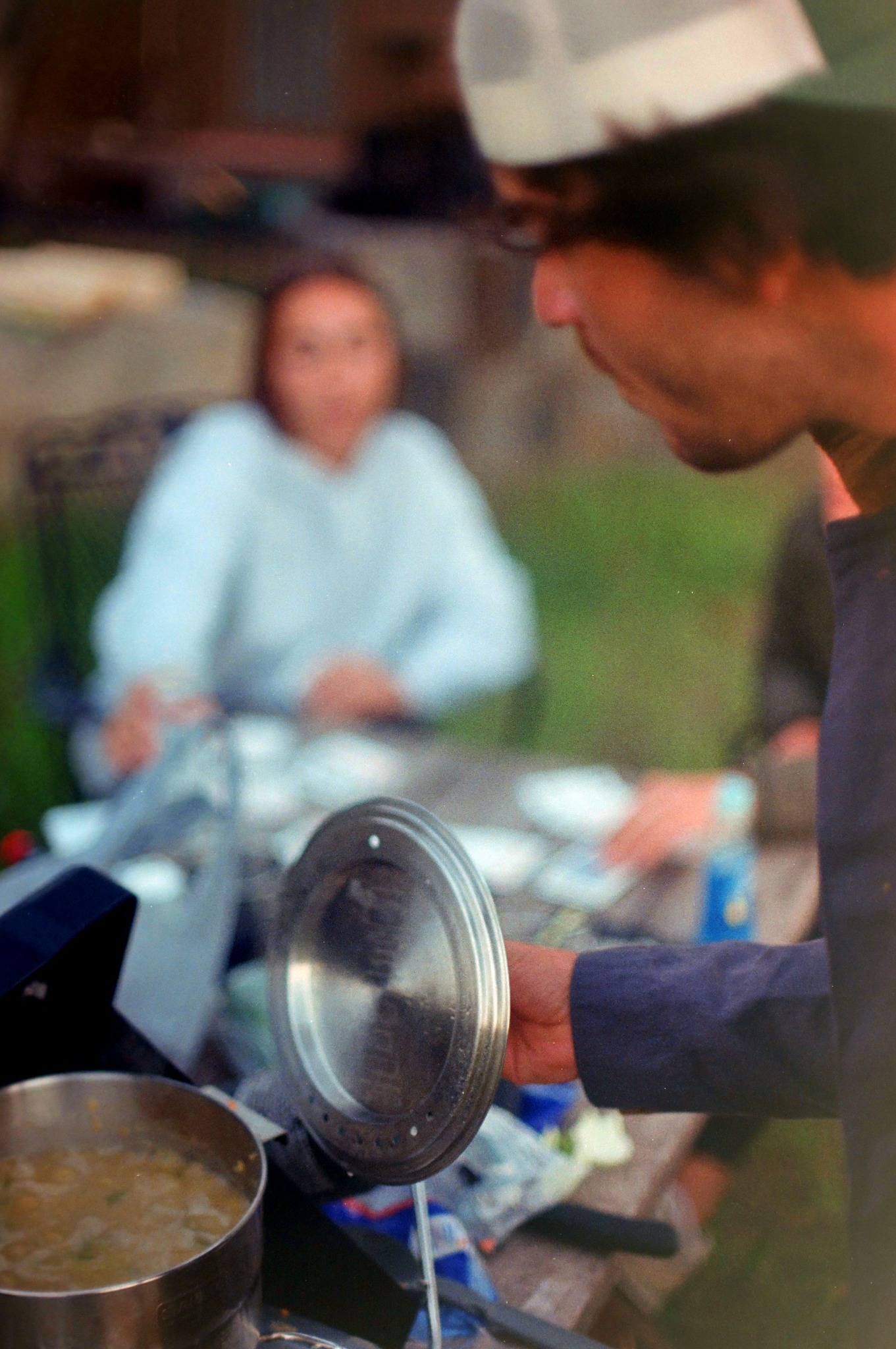 Cooking dinner at a campsite