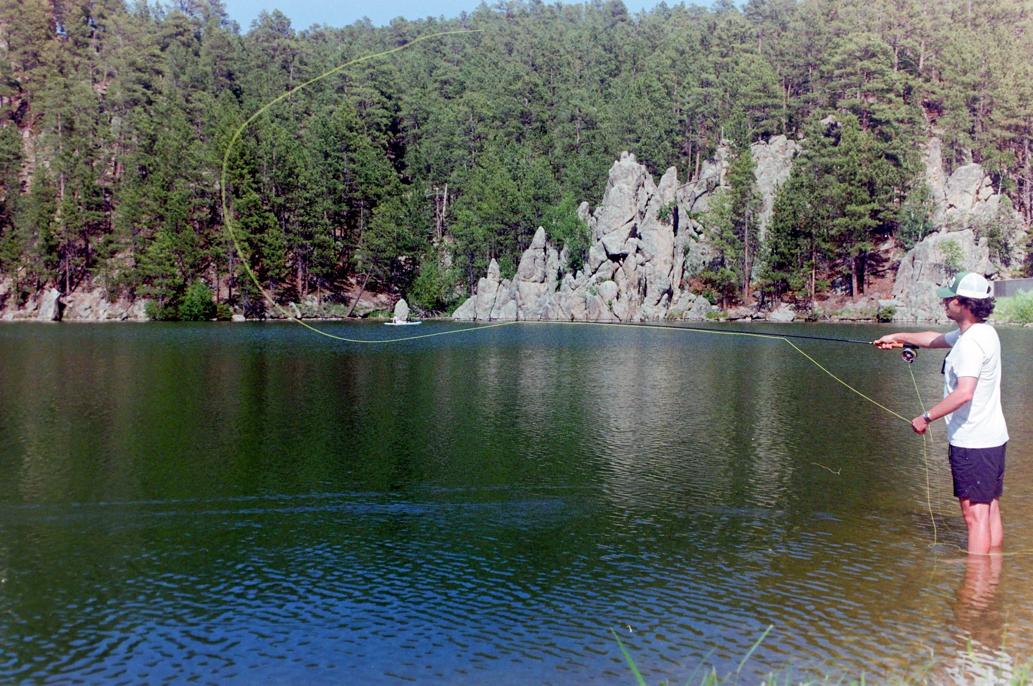Fly fishing on a mountain lake